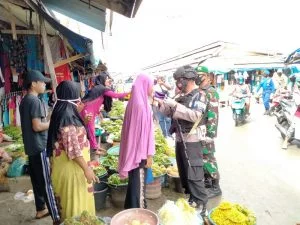 Tni polri di tual swiping penggunaan masker menuju new normal