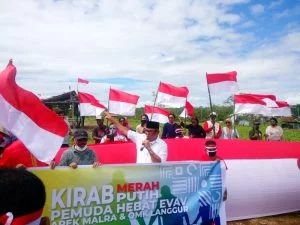 Bupati malra kirab merah putih bersama pemuda evav bersatu di kebun kesyang