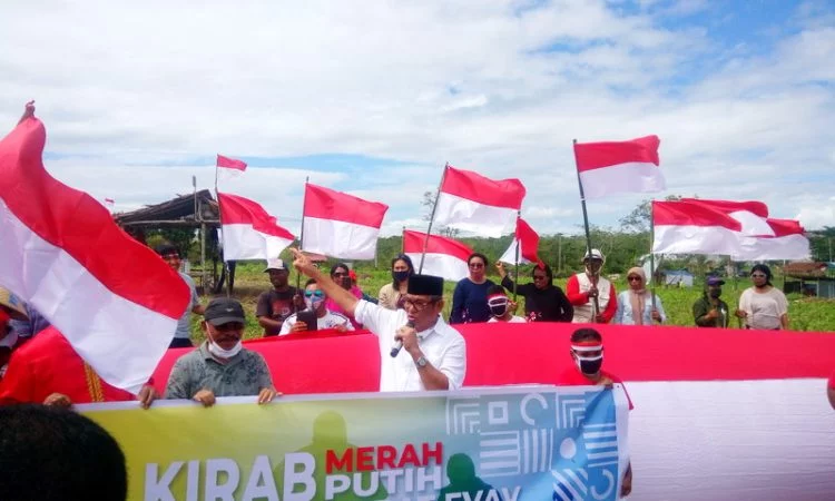 Bupati malra kirab merah putih bersama pemuda evav bersatu di kebun kesyang